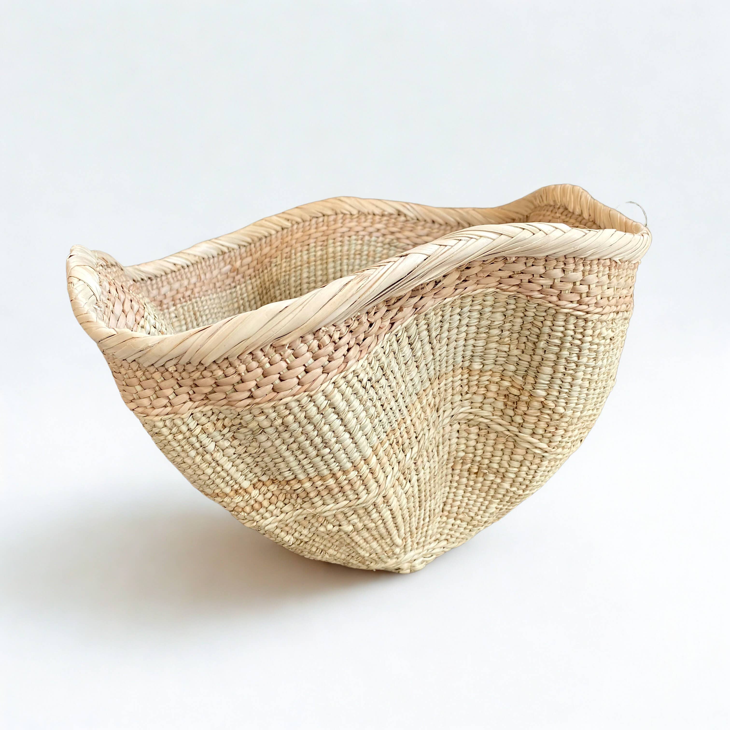 Dramatic Rippled Palm Leaf Dancing Basket