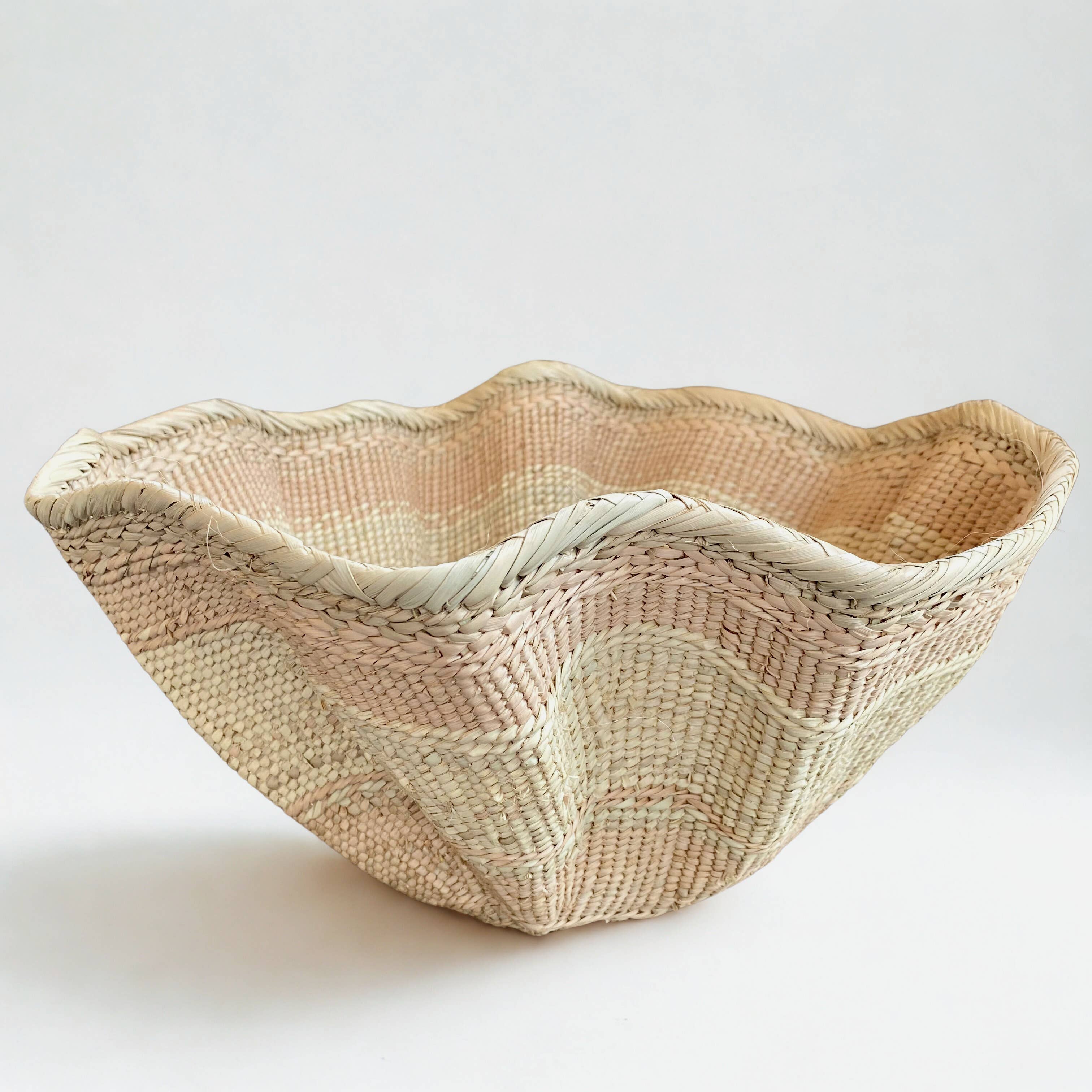 Dramatic Rippled Palm Leaf Dancing Basket