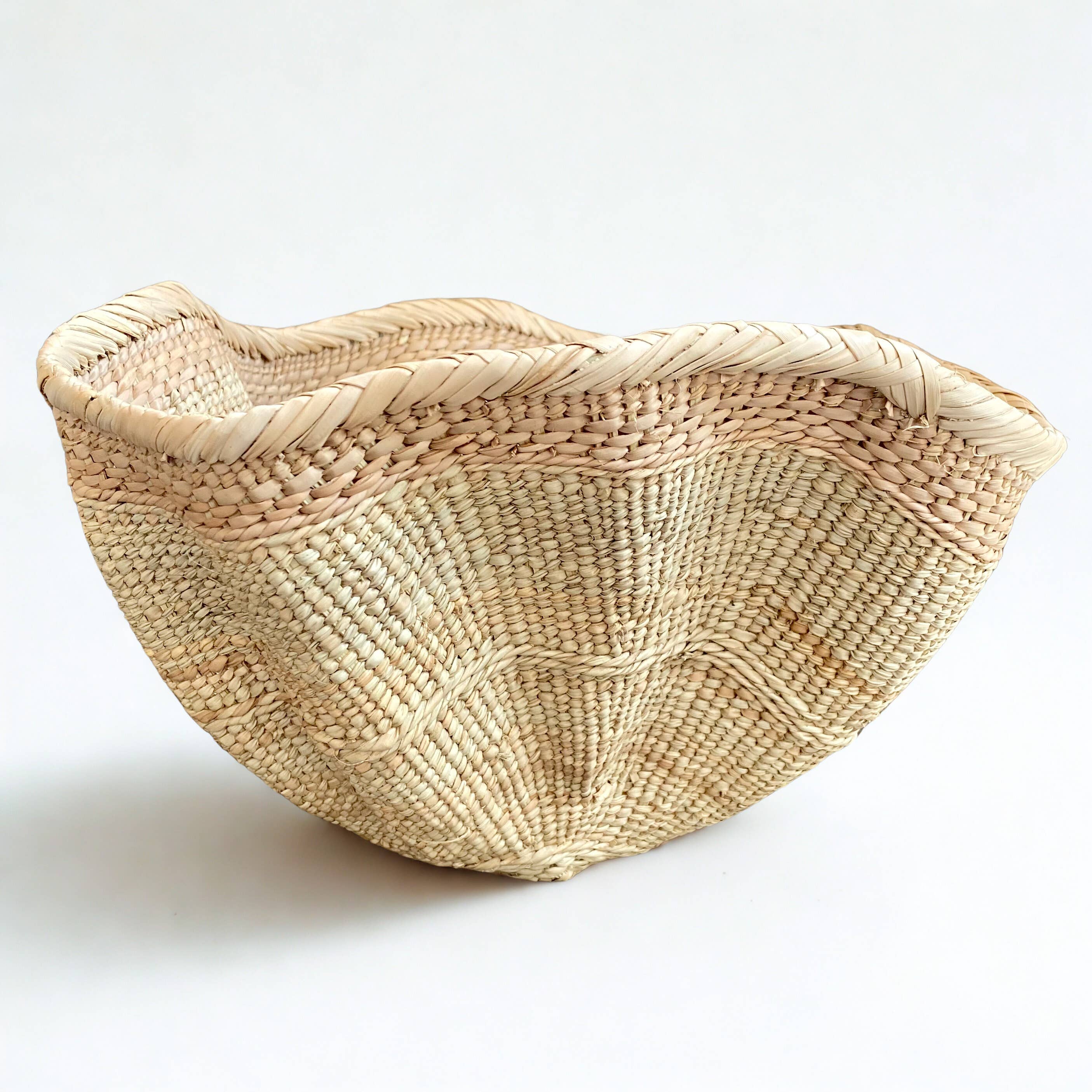Dramatic Rippled Palm Leaf Dancing Basket